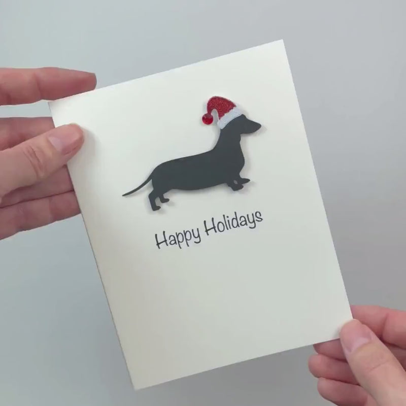 Black Smooth Dachshund Sporting Clip Christmas Cards Pack of 10 White Base | Handmade Dog Holiday Notecard Set | Sparkly Santa Hat Greeting